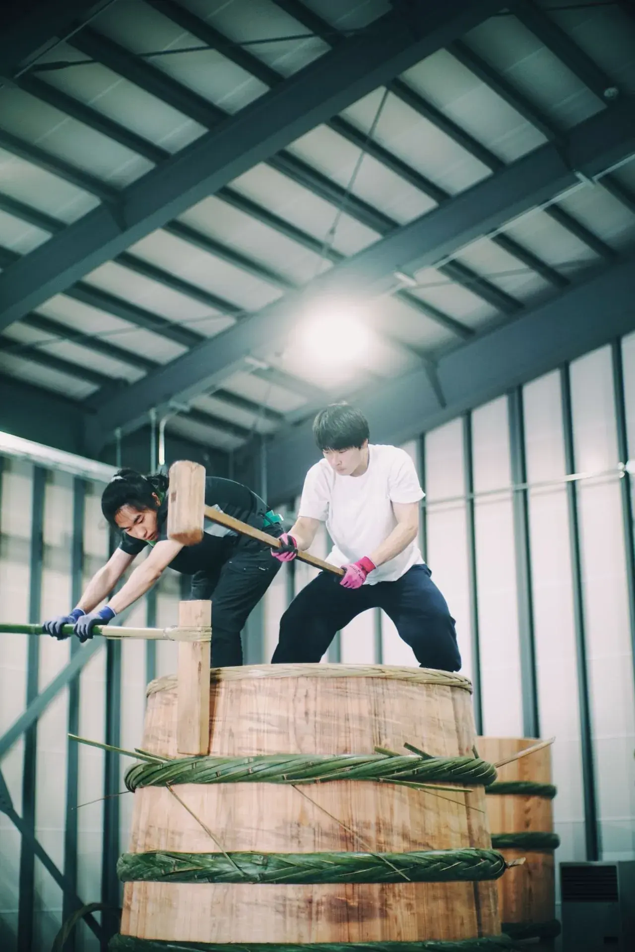 Distillery team constructing a traditional wooden washback